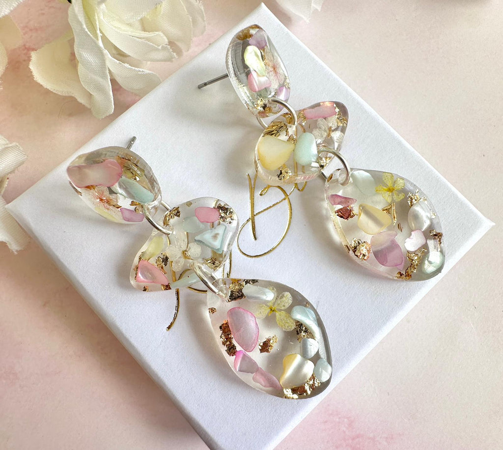Pastel Seashell & Bloom pebble drop stud earrings.