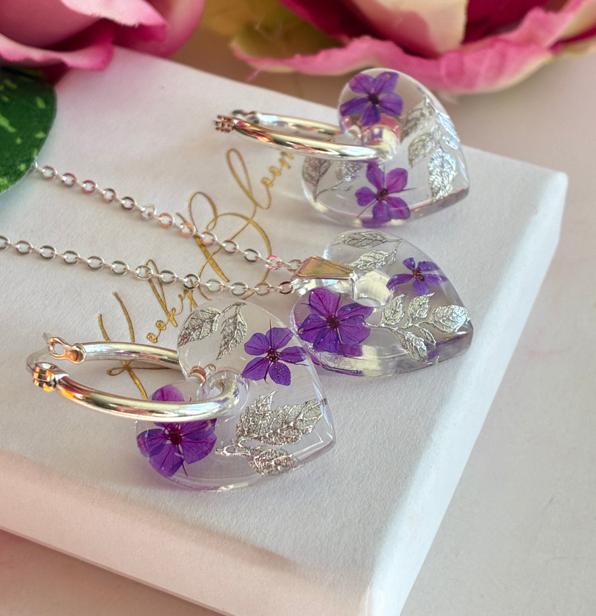 Silver Frosted Violet heart necklace.
