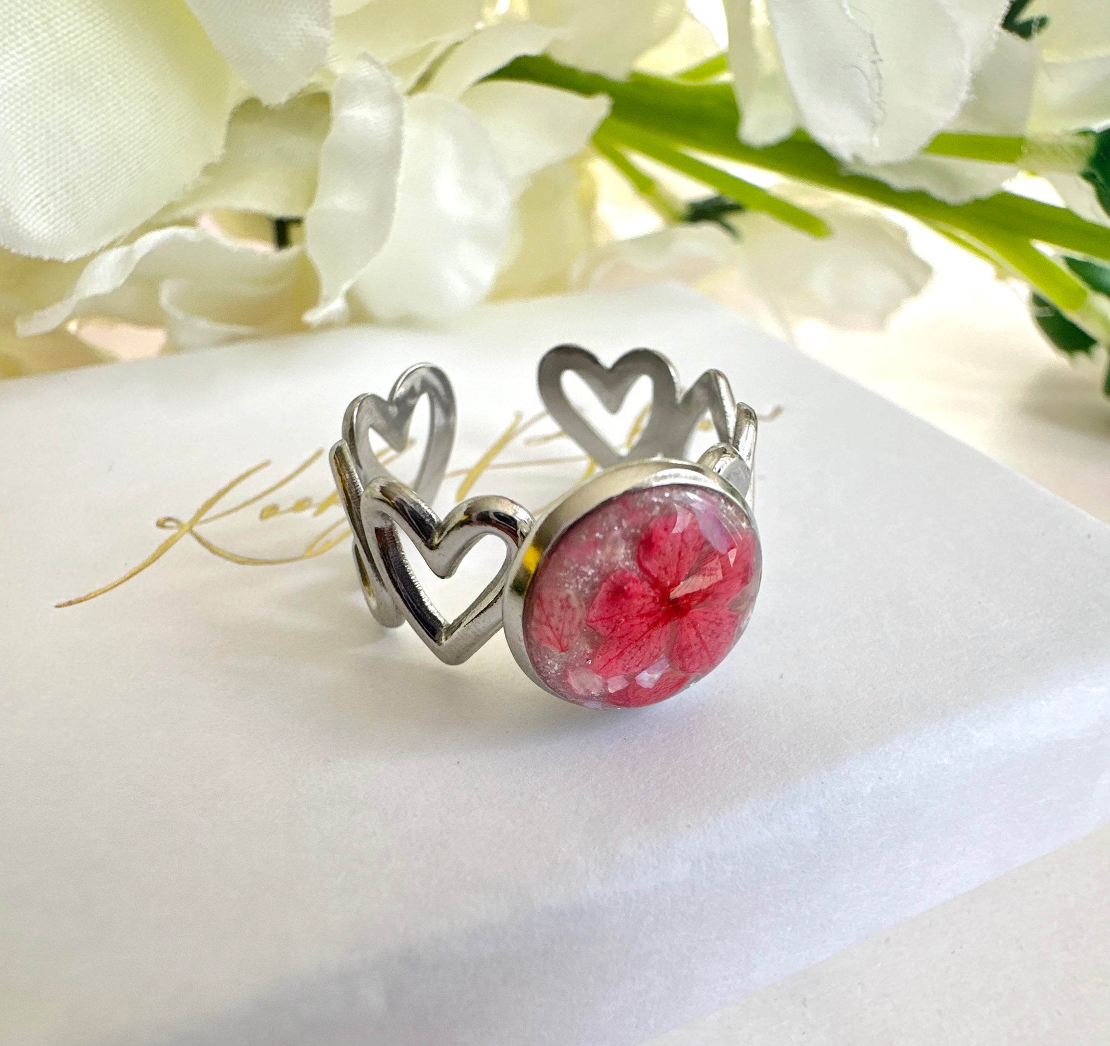 Silver Coral bloom Heart cuff ring.