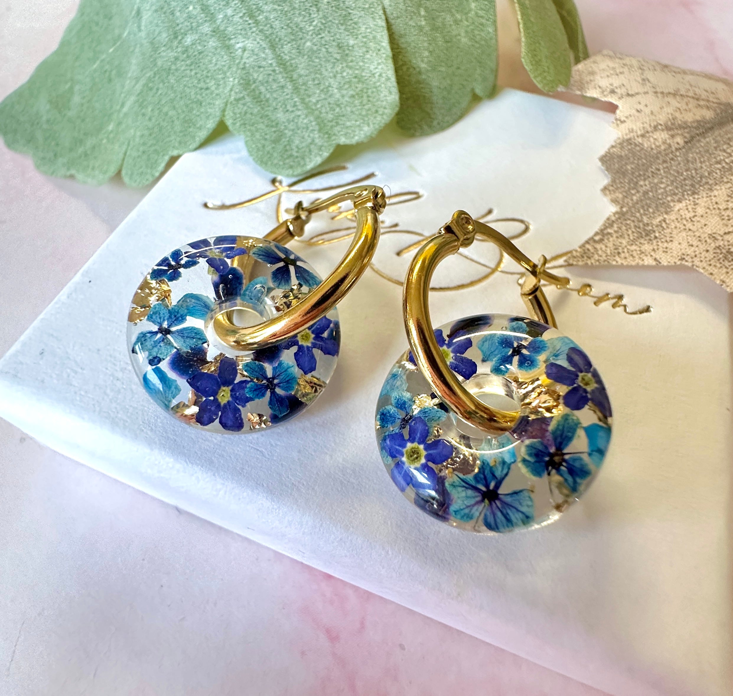 Denim Donut bloom earrings.