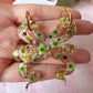 Snake real flower hoop earrings.