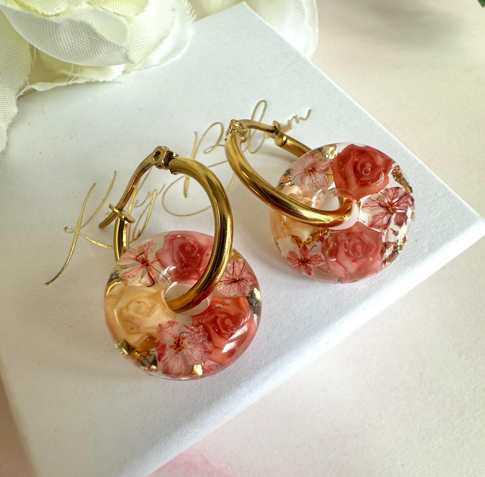 Terracotta rose donut hoop earrings.