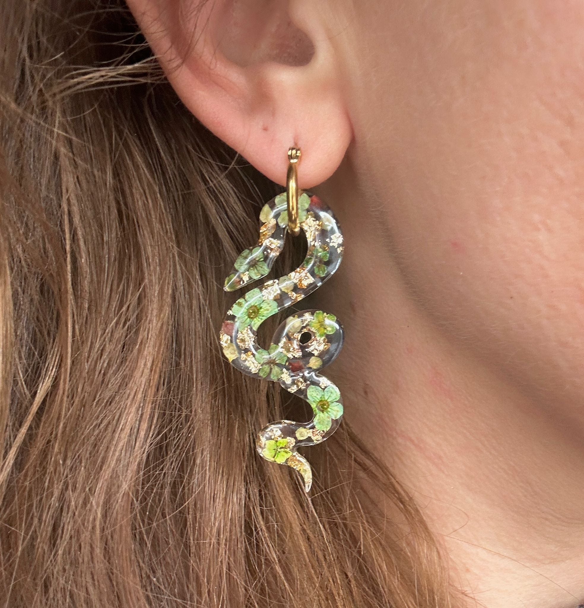 Snake real flower hoop earrings.