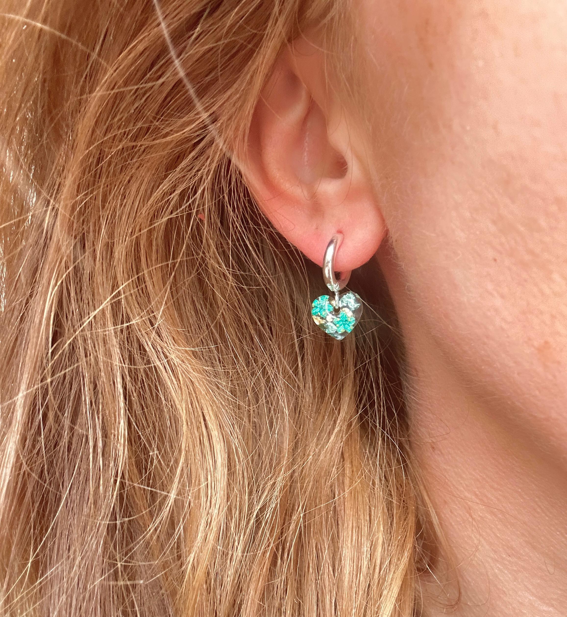 Silver Tiny Turquoise bloom heart Huggies earrings.