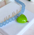 Glass Blue beaded Green heart necklace.