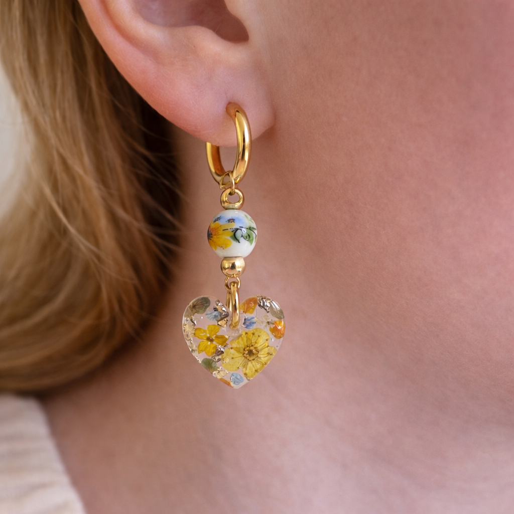 Sunflower Bead Blossom heart drop hoop earrings.