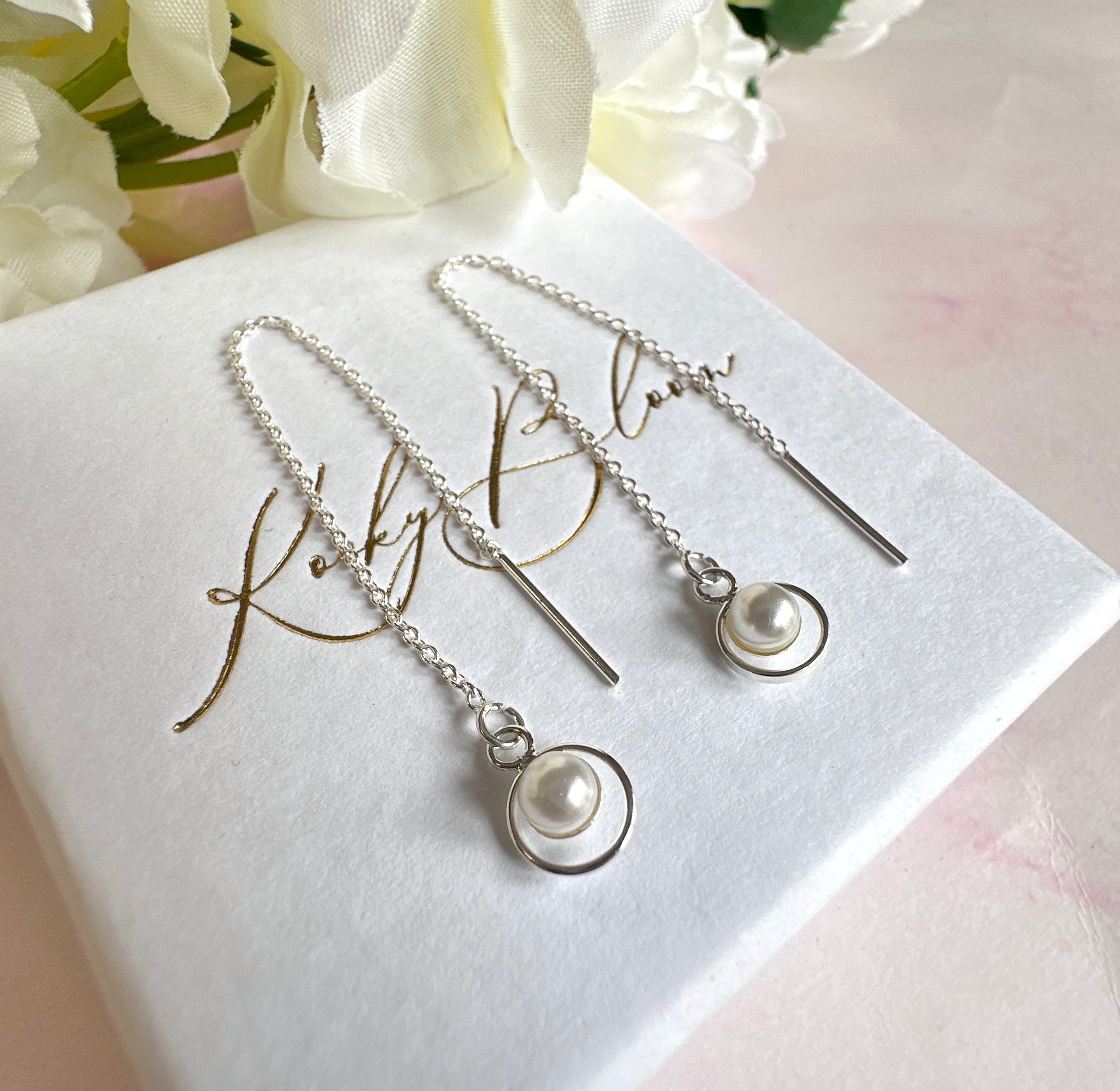925 sterling silver Pearl thread through earrings.