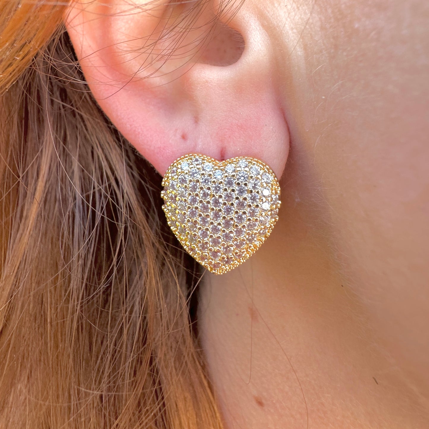 Gold CZ caged back Heart earrings.
