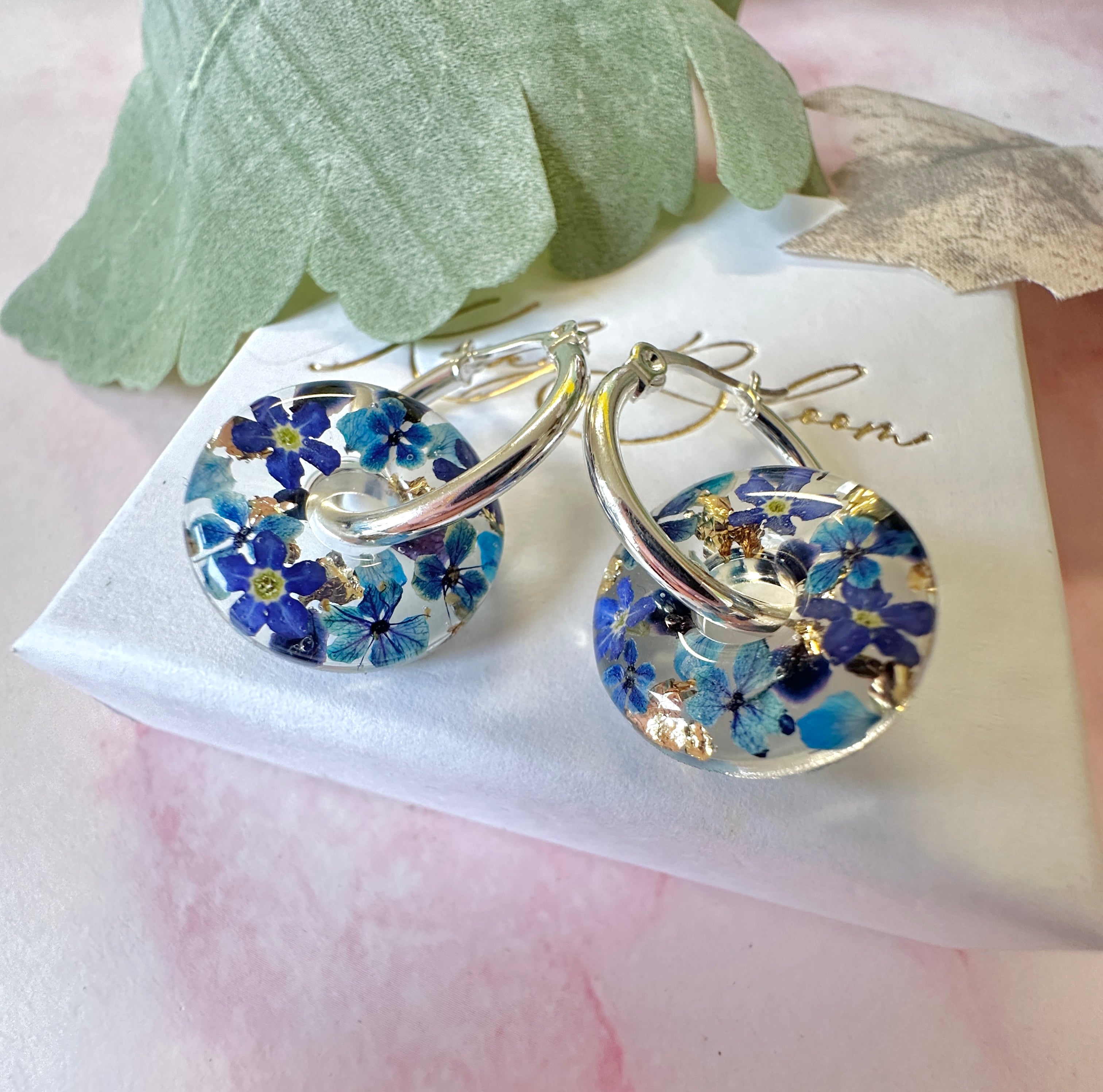 Denim Donut bloom earrings.