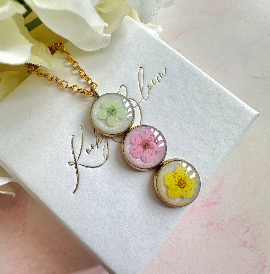Gold Triple blossom drop necklace.