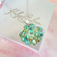 Silver Aqua Seashell Bloom necklace.