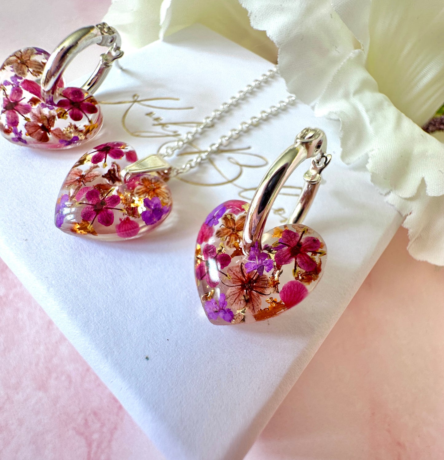 Black Forest flower heart hoop earrings.