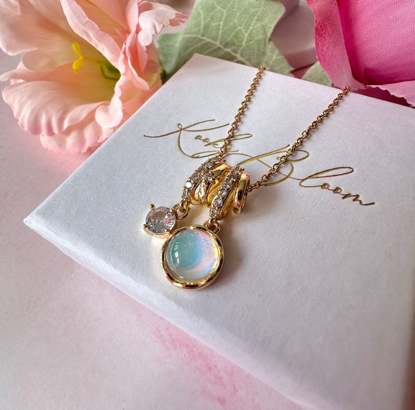 Gold opalescent cz charm cluster Necklace.