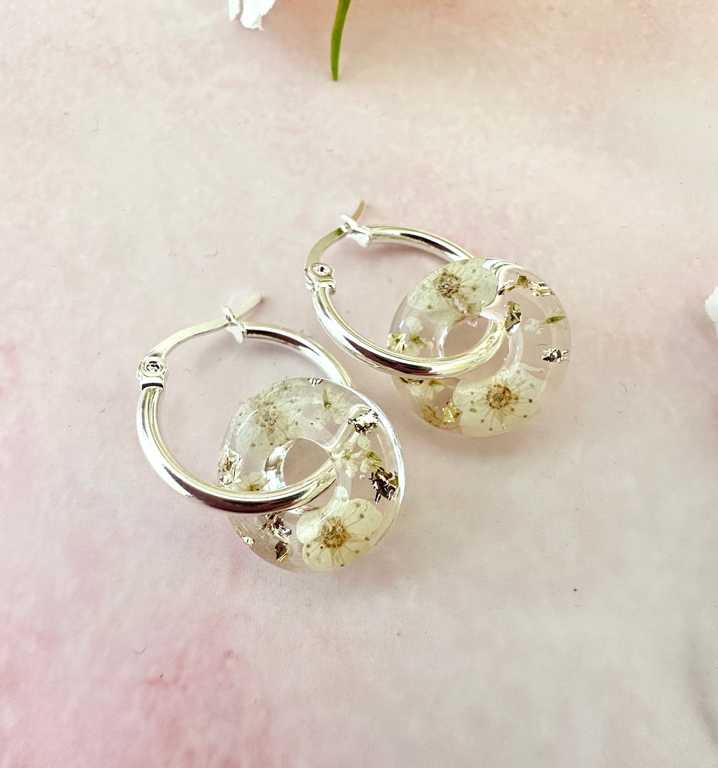White blossom bloom flower donut earrings.