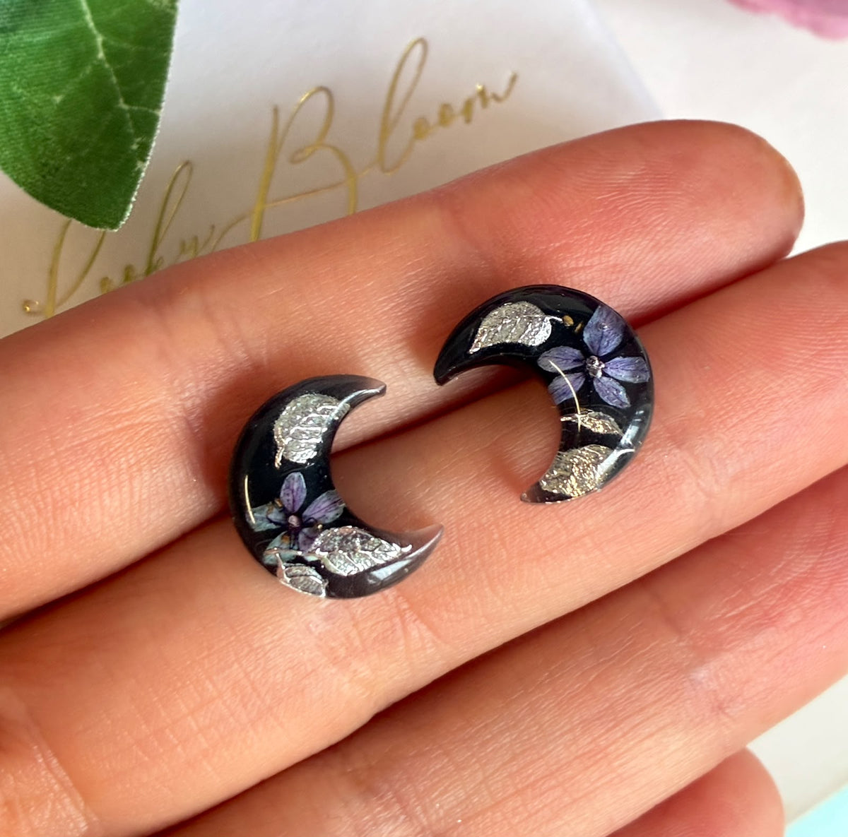 Mystical Dark Bloom Moon stud earrings.