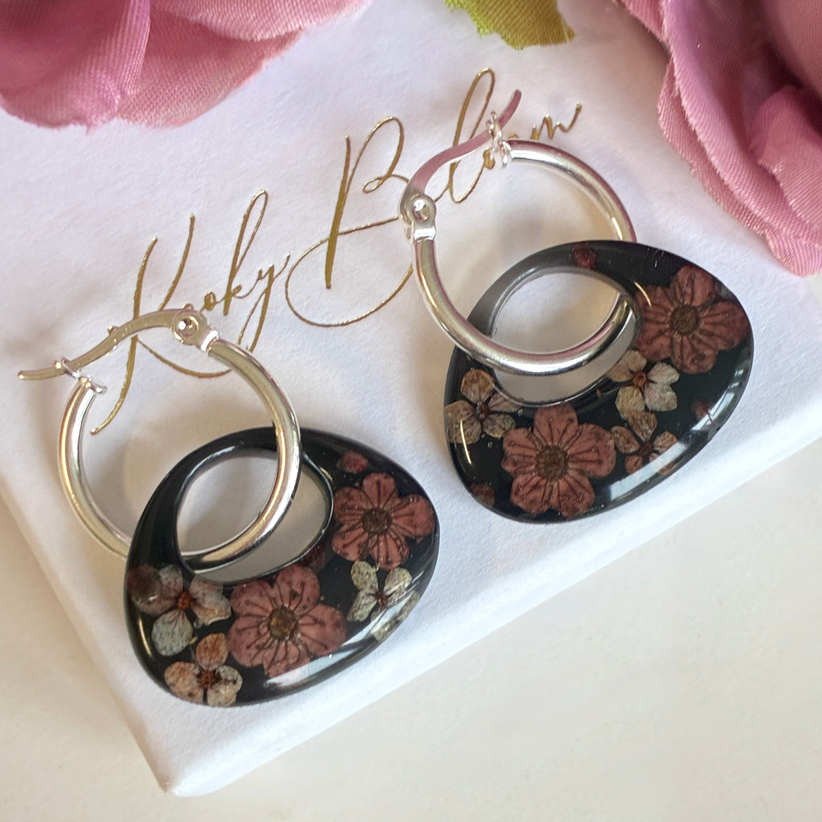 Dark chocolate blossom Oval hoop earrings.