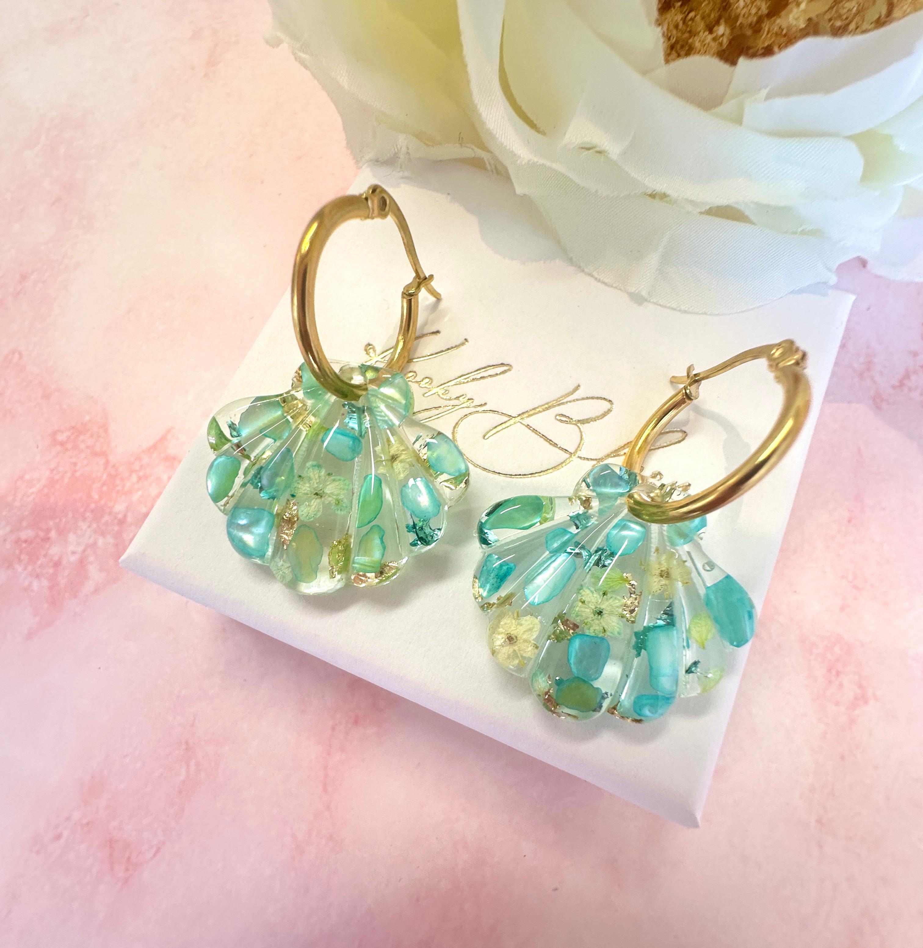 Aqua Seashell bloom hoop earrings.