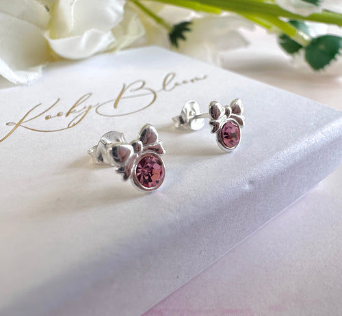 925 sterling silver Pink CZ Bow stud earrings.