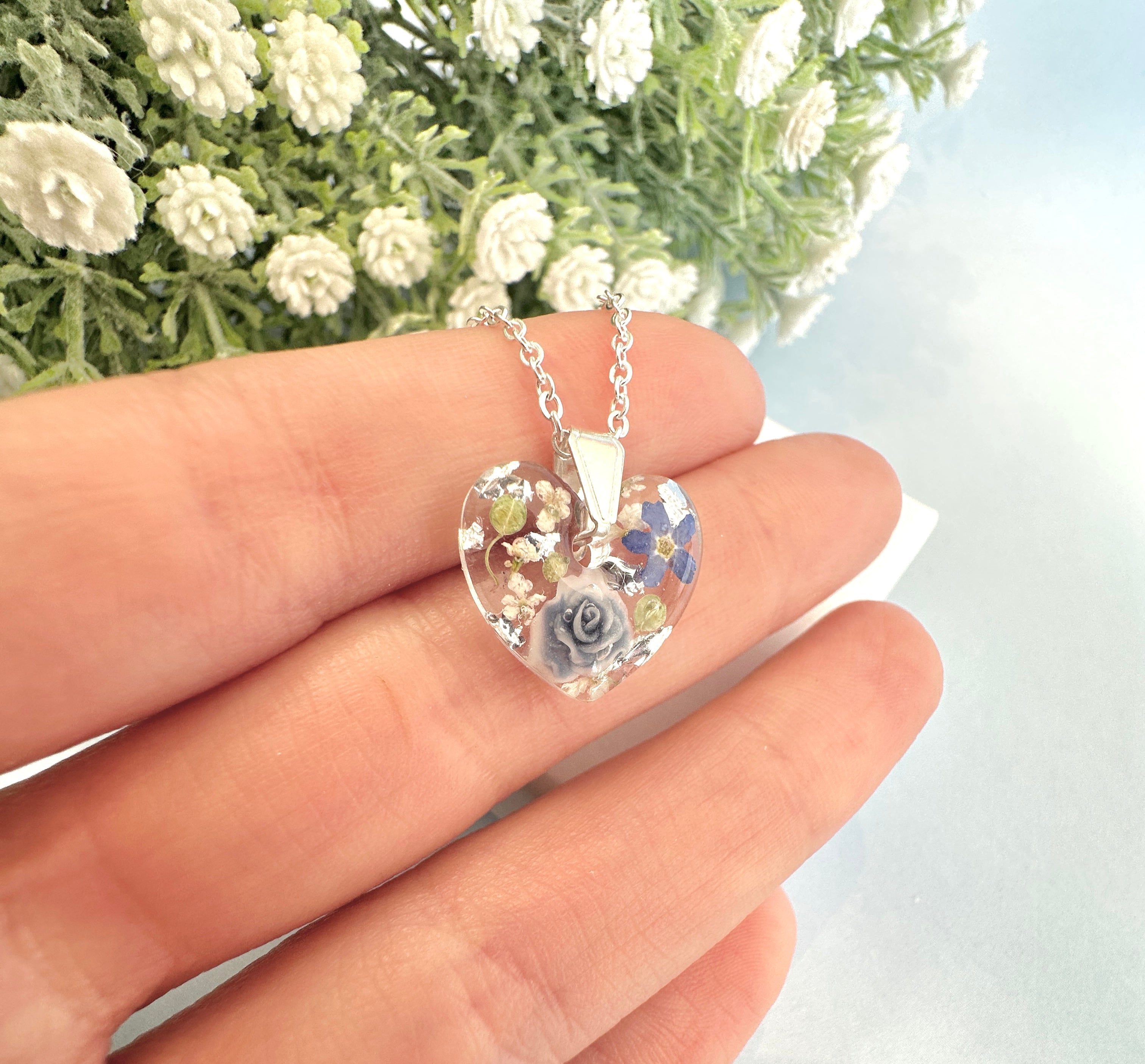 Silver Powder Blue Forget me not Heart necklace.