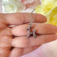 Silver Balloon dog necklace.