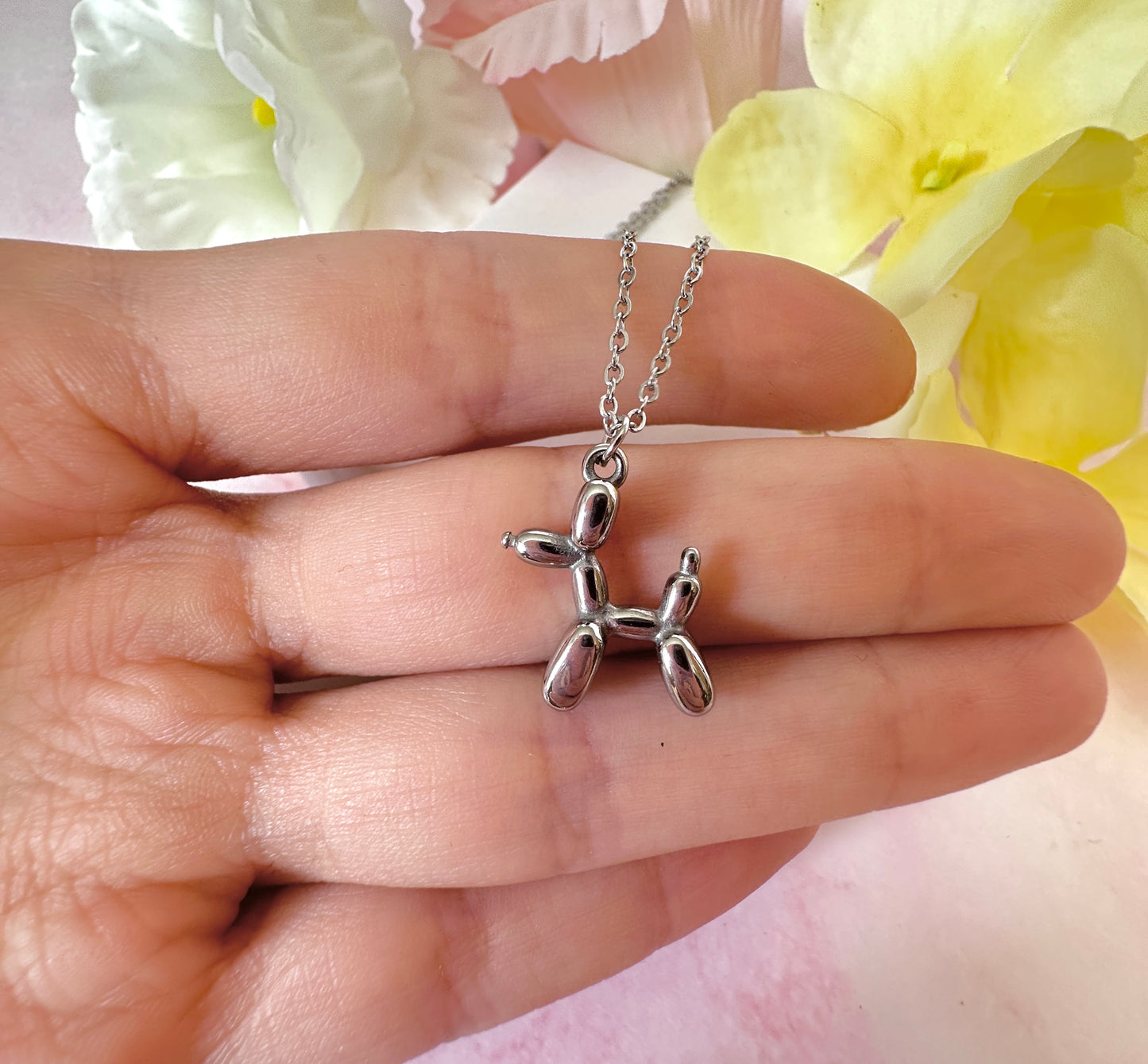 Silver Balloon dog necklace.