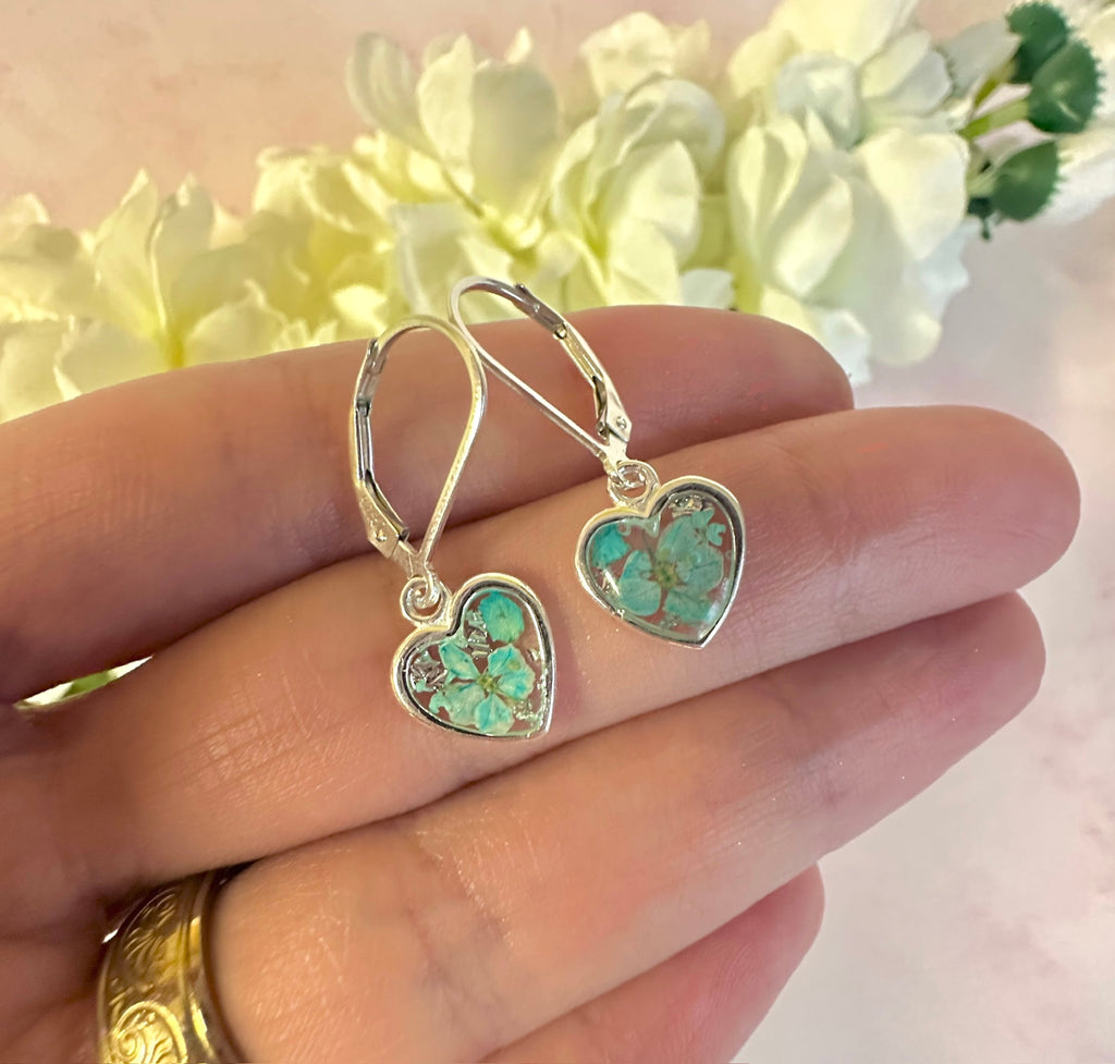 925 sterling silver Aqua Petal heart huggie earrings.