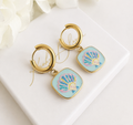 Gold pastel seashell Tile chunky huggie earrings.