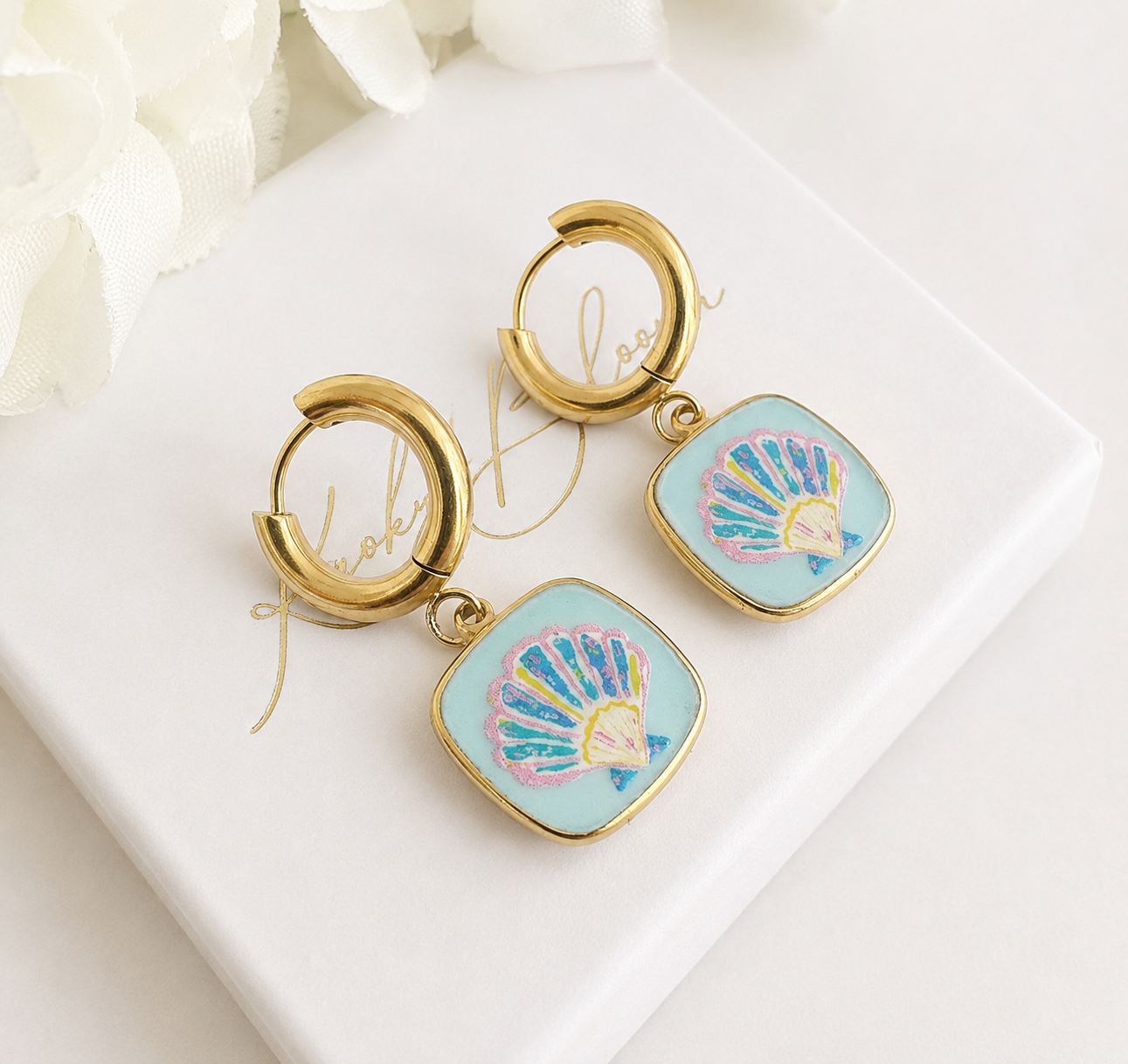 Gold pastel seashell Tile chunky huggie earrings.