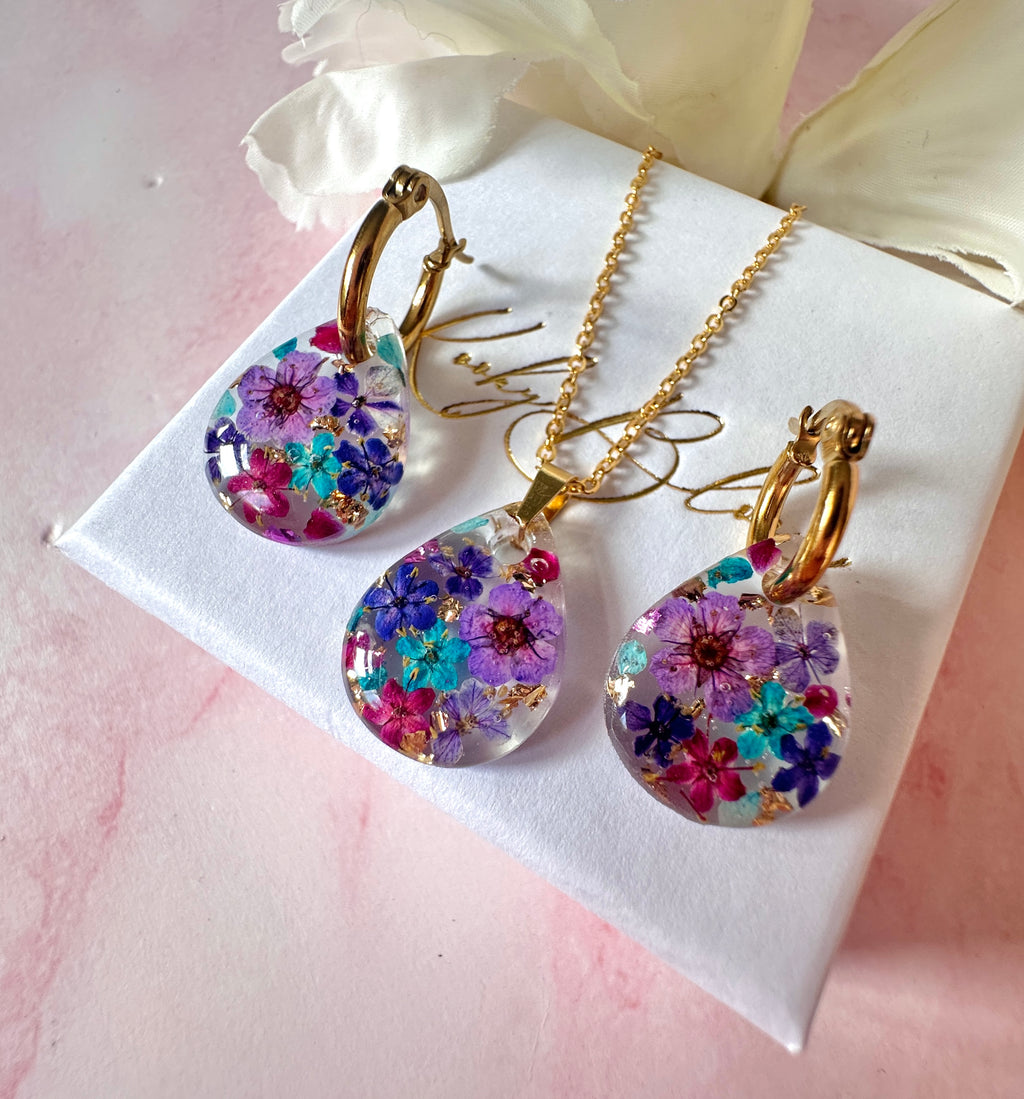 Purple Rain Bloom Teardrop hoop earrings.