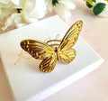Gold oversized Butterfly adjustable ring.