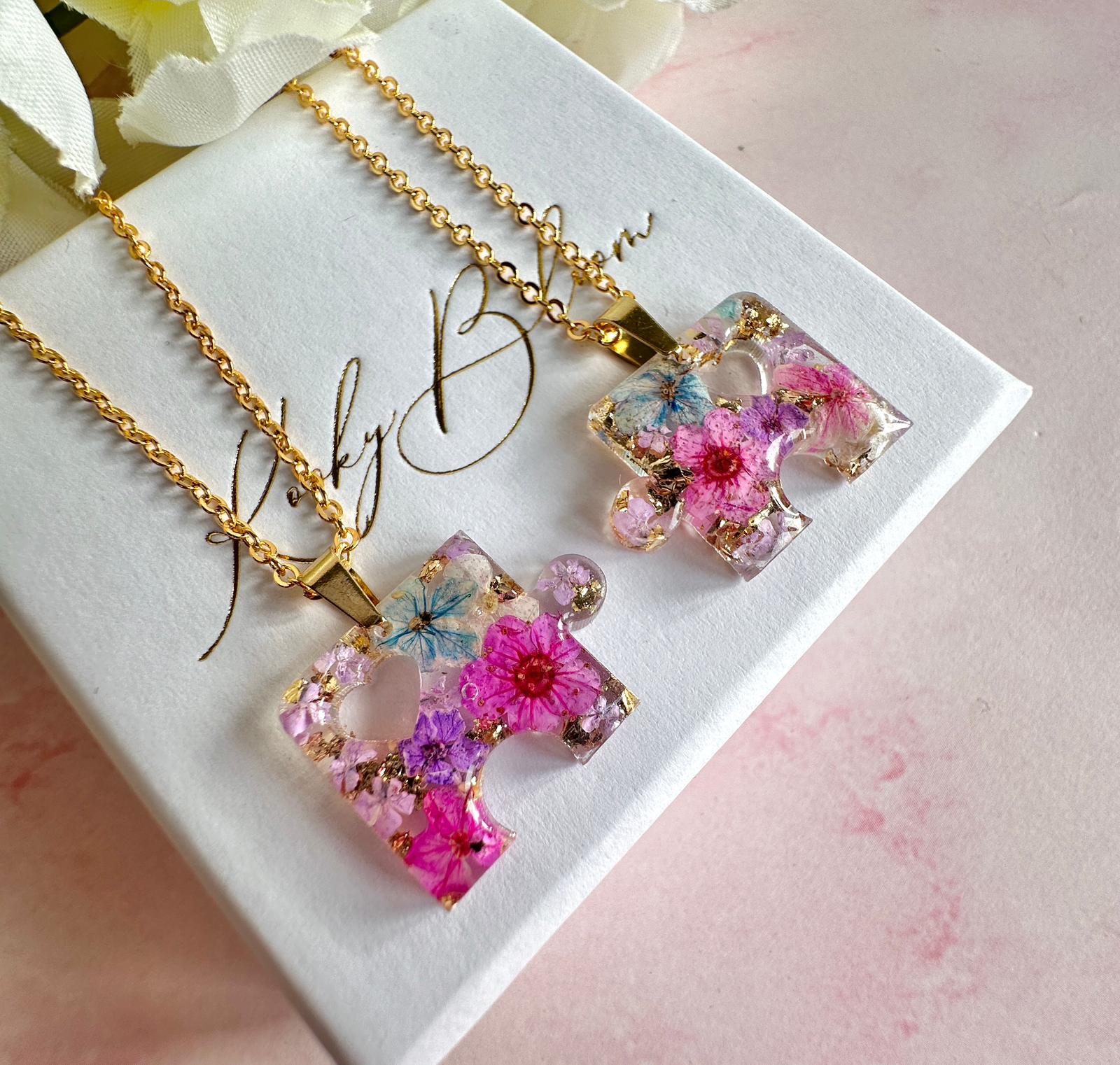 Gold real flower Jigsaw puzzle piece necklace.
