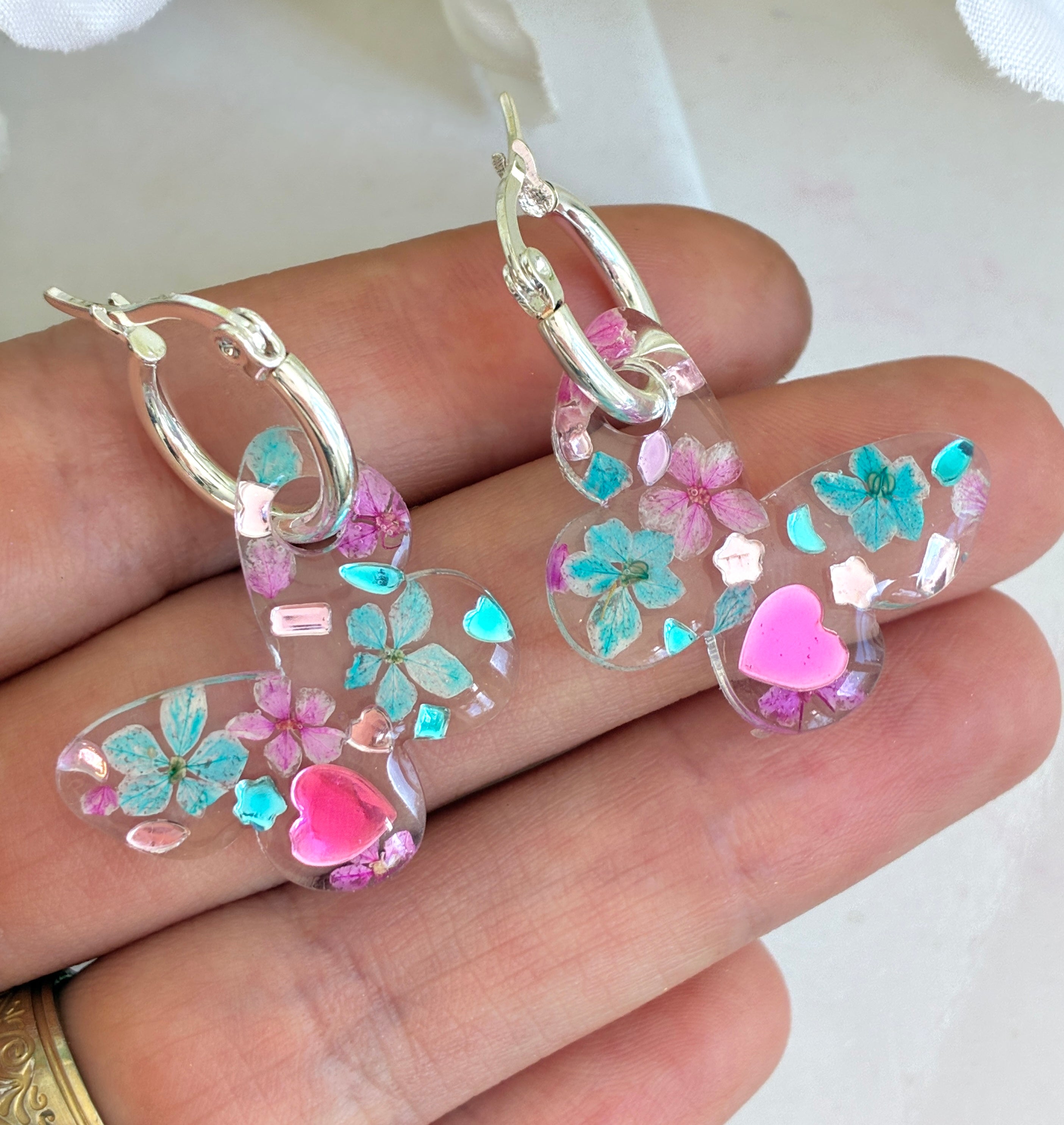 Pink Blue bloom Butterfly hoop earrings.