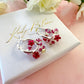 Tiny Dark Pink bloom flower earrings.