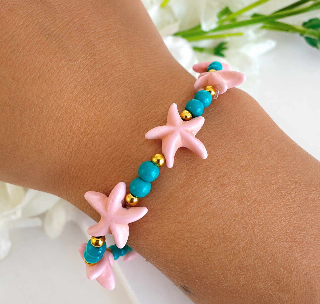 Turquoise & Pink Starfish bead stretch bracelet.