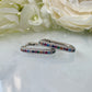Silver Rainbow stone Rectangle Huggie earrings.