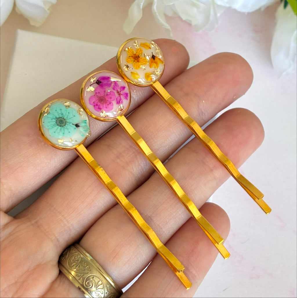 Gold set of 3 Bloom flower hair slides.