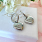 Silver Heart Engraved star Huggie hoop earrings.