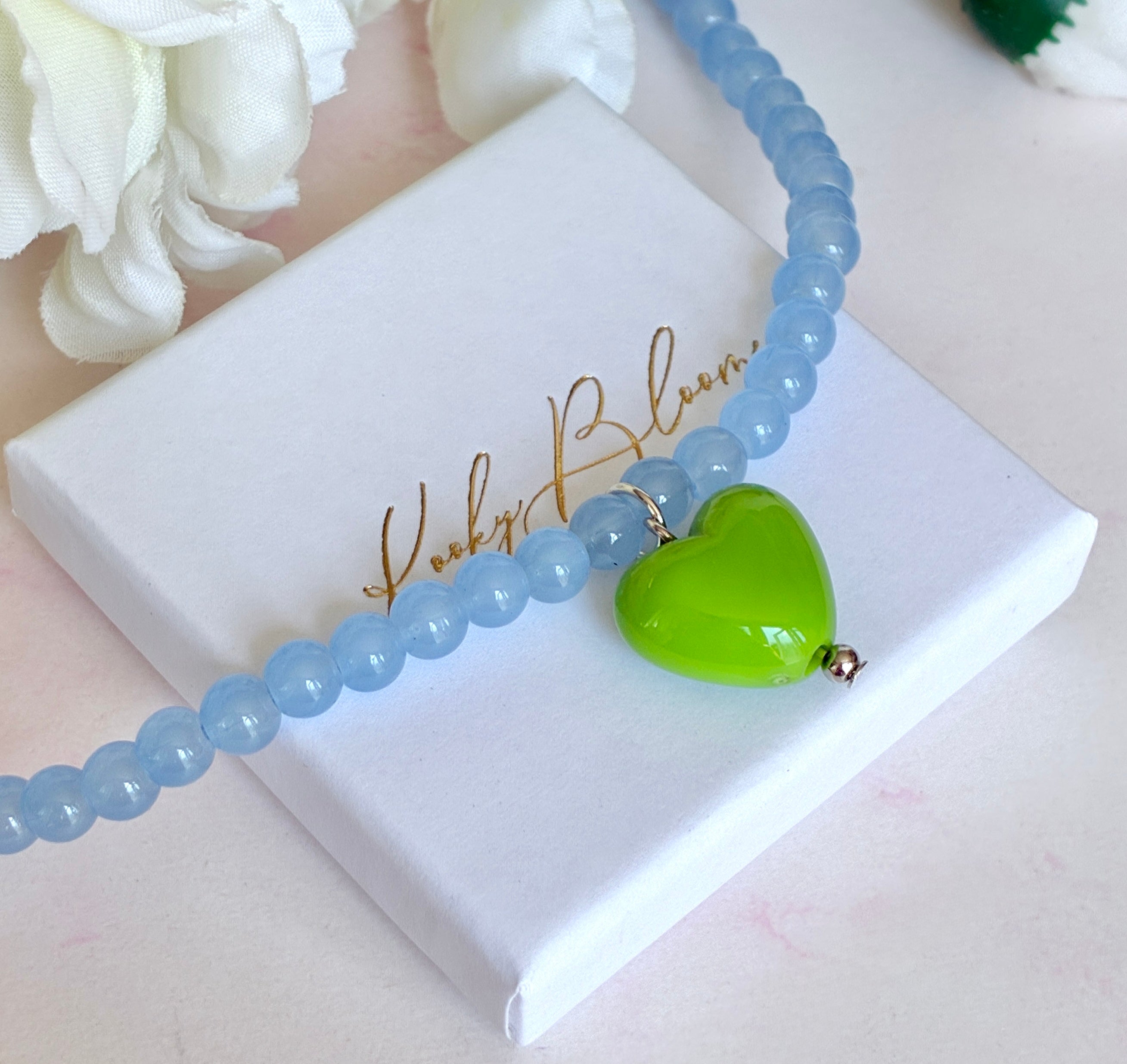 Glass Blue beaded Green heart necklace.