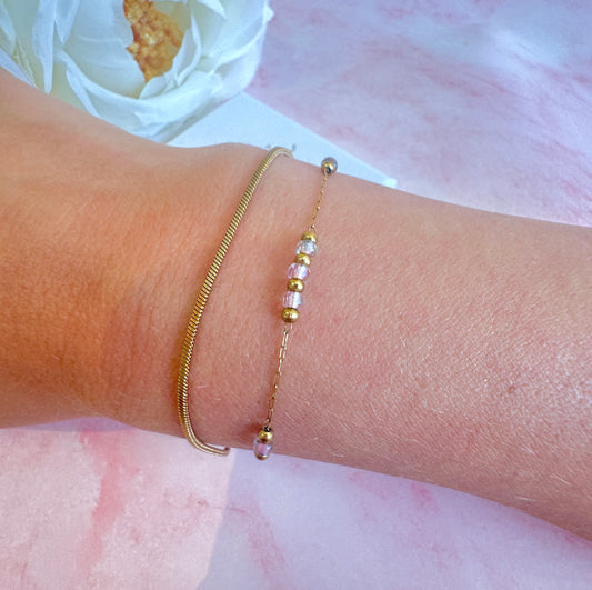 Gold double layered Purple bead bracelet.