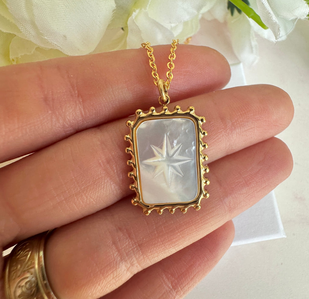 Gold engraved Star shell rectangle necklace.