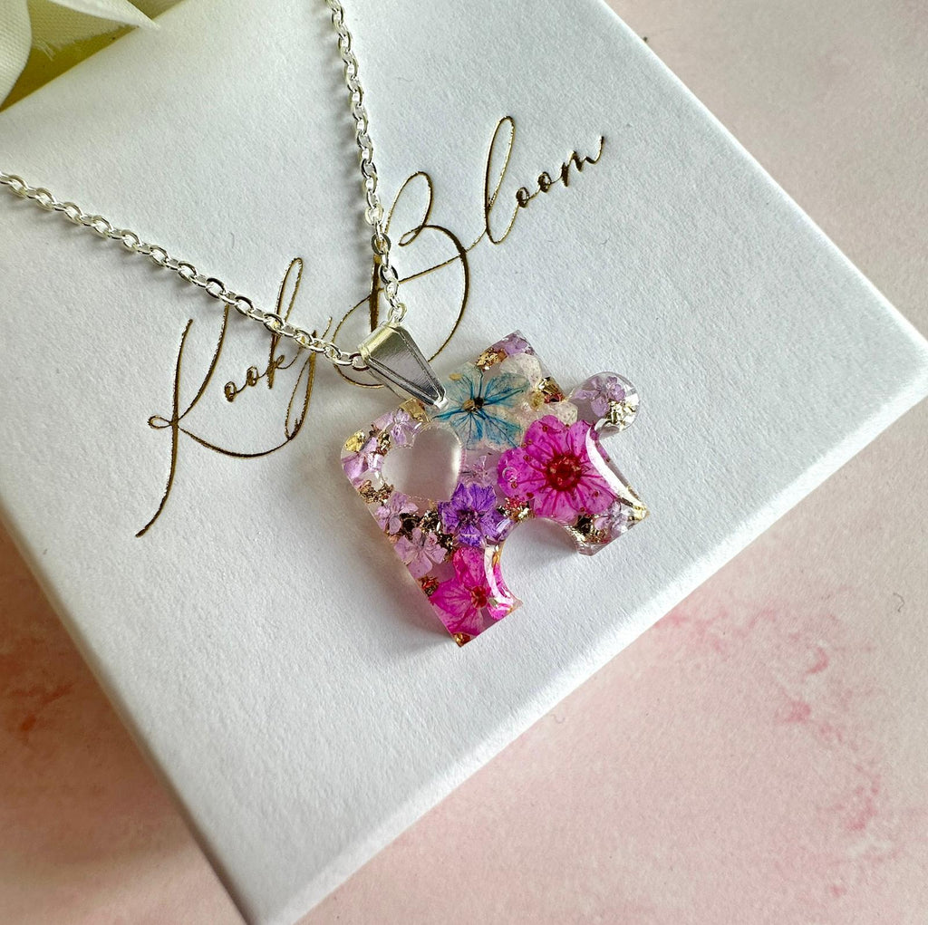Silver real flower Puzzle piece Necklace.