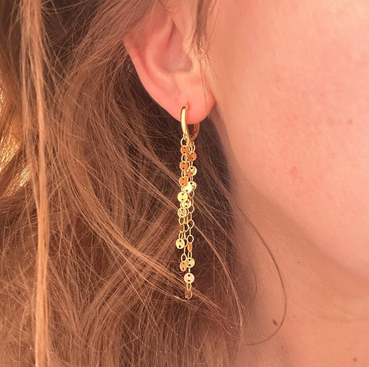 Gold glitzy chain drop huggie earrings.