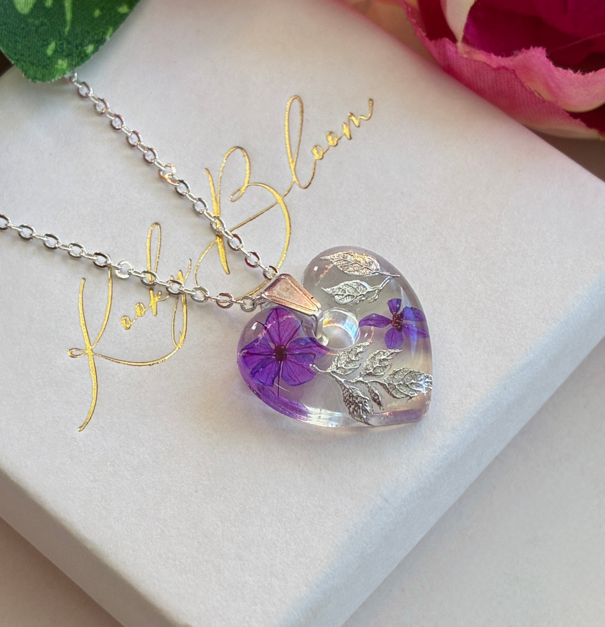 Silver Frosted Violet heart necklace.