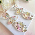 Pastel Seashell & Bloom pebble drop stud earrings.
