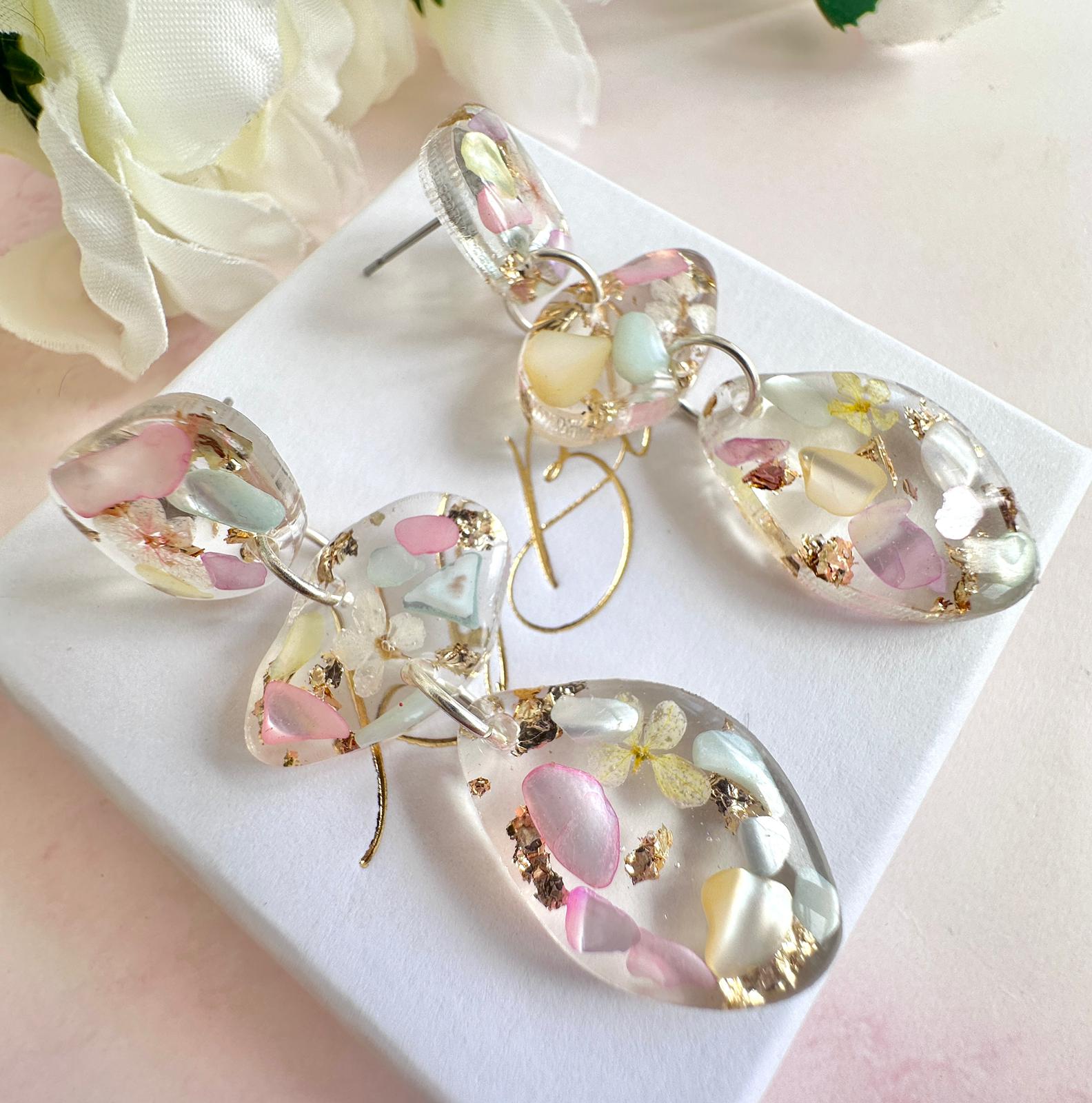 Pastel Seashell & Bloom pebble drop stud earrings.