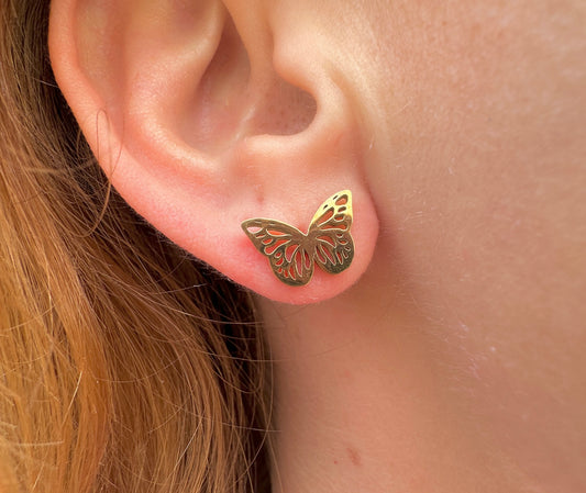 Gold butterfly Stud earrings.