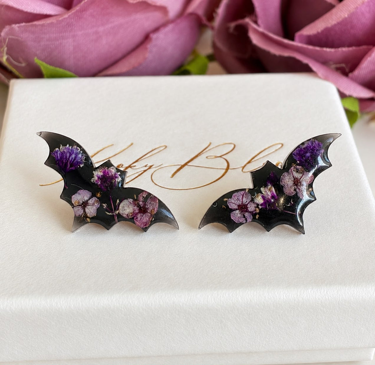 Black Purple bloom Bat Stud earrings.