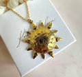 Gold engraved Sun face necklace