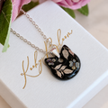 Silver Black Mystical cat necklace.