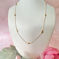 Gold dainty engraved star diamond necklace.